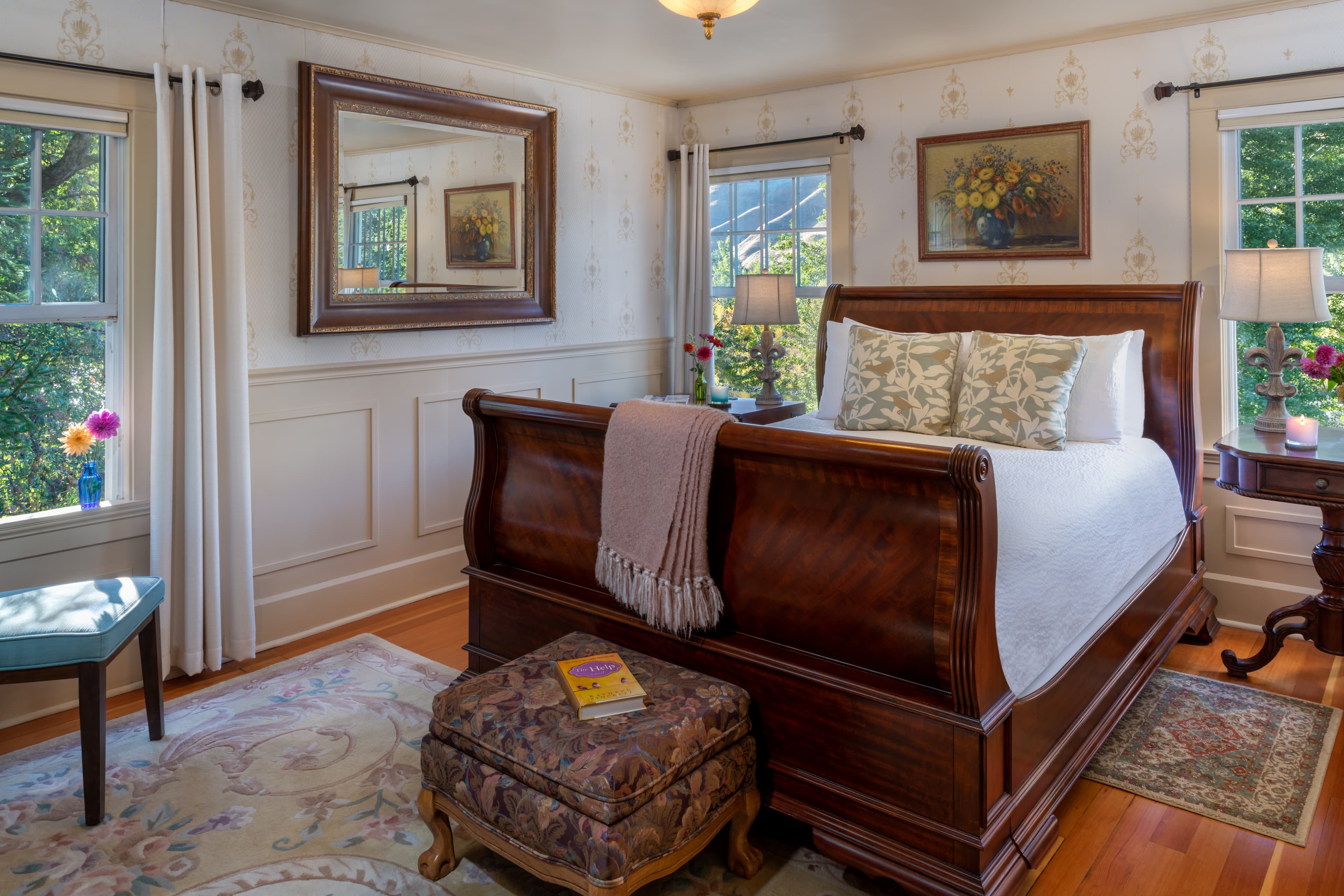 English room queen bed and side windows