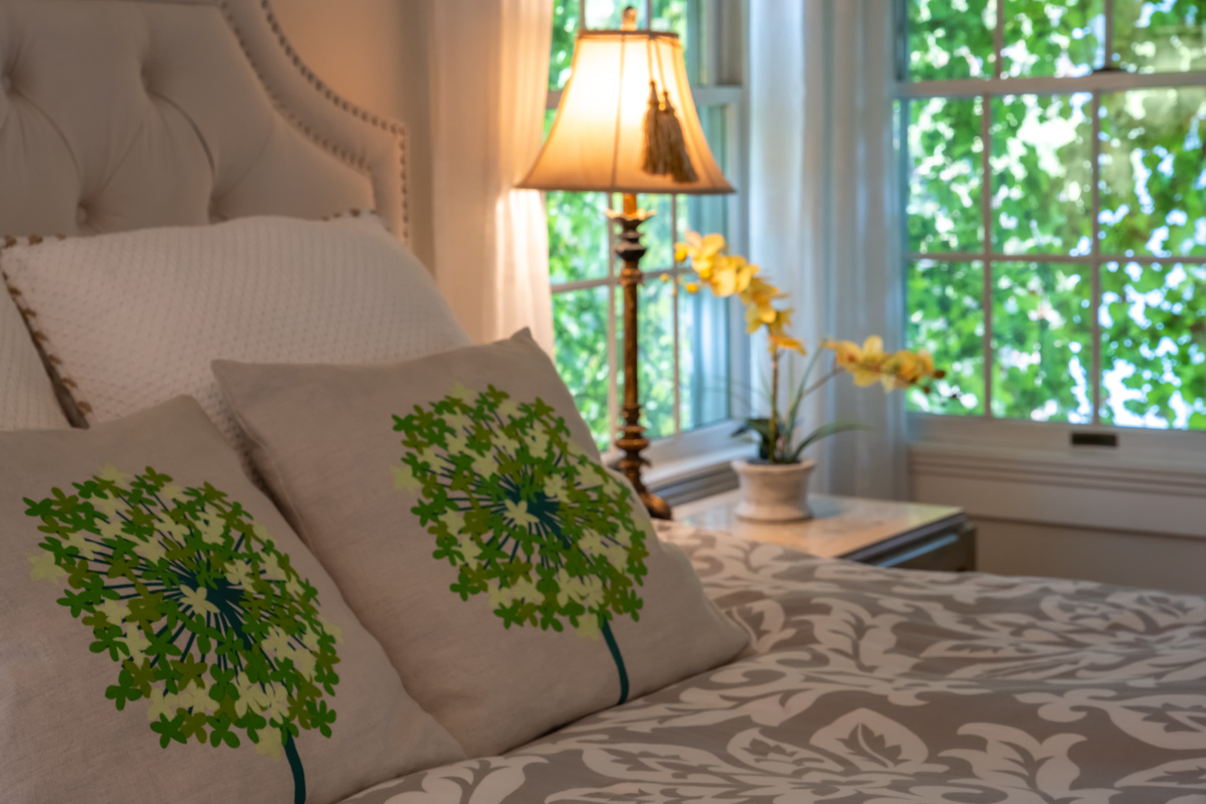 Garden Suite king size bed and bright corner windows