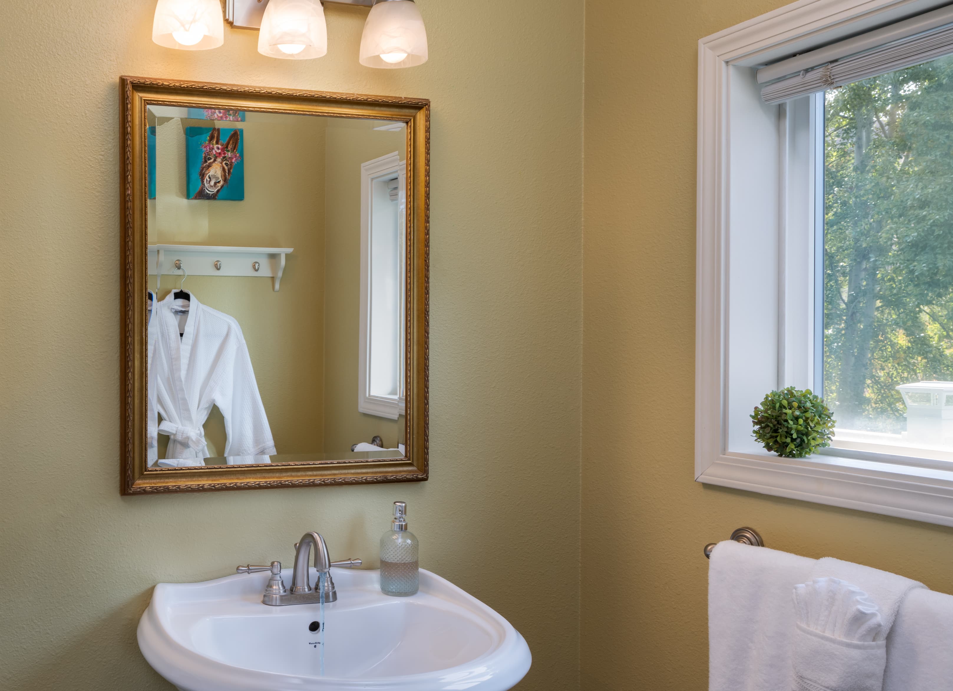 Orchard room private bath with shower and vanity sink